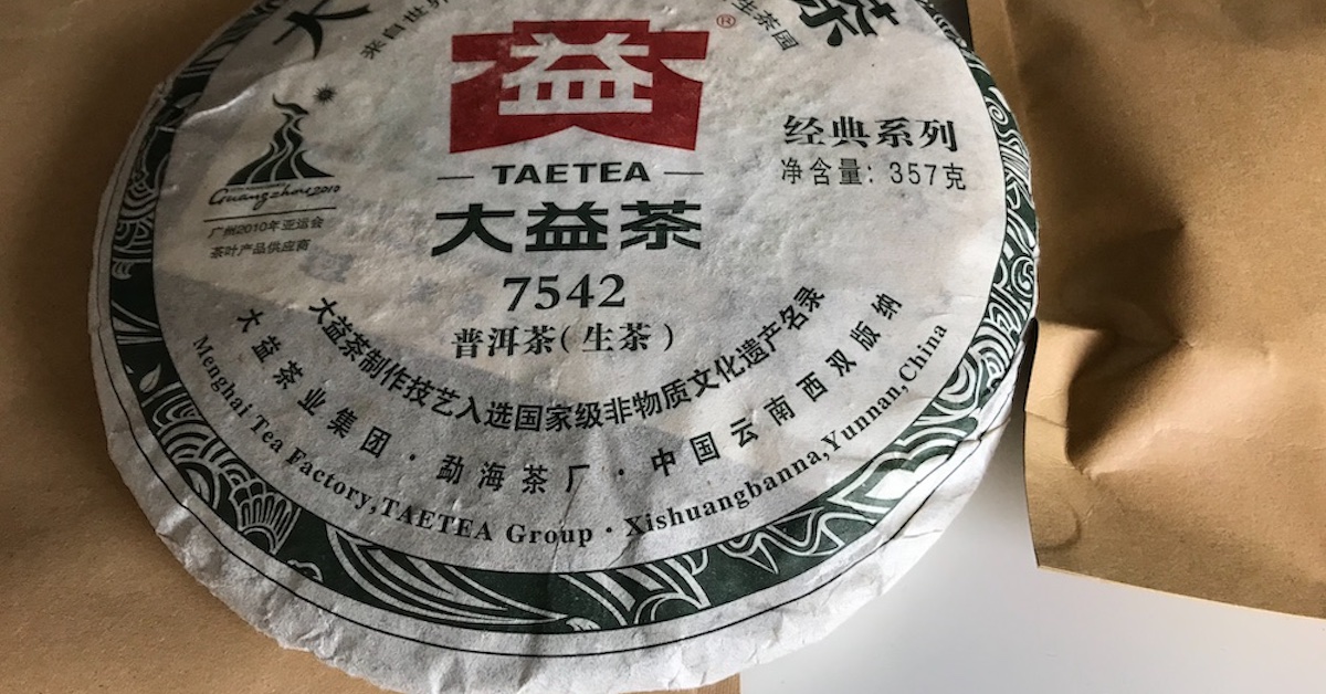 Dayi Menghai tea factory 7542 raw Pu Erh tea cake