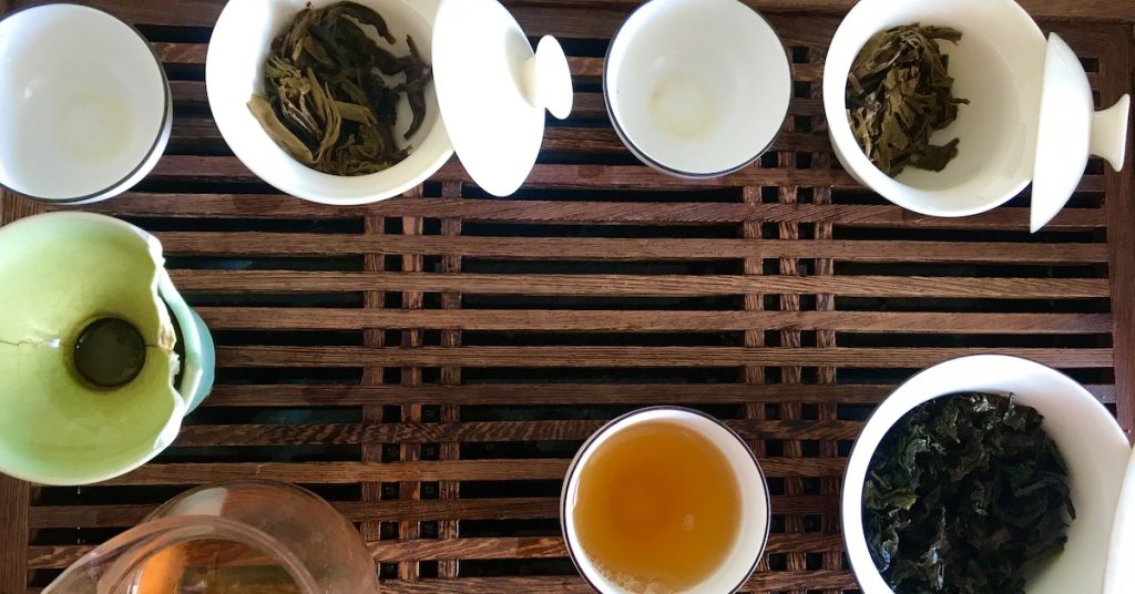 Various types of green tea in gaiwans